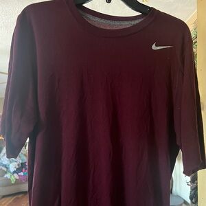 Nike maroon Medium men’s dry fit tee shirt.